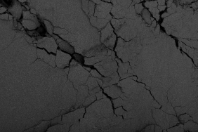 black-background-with-cracked-sand